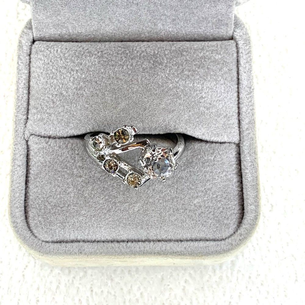 Silver plated ring with clear stones